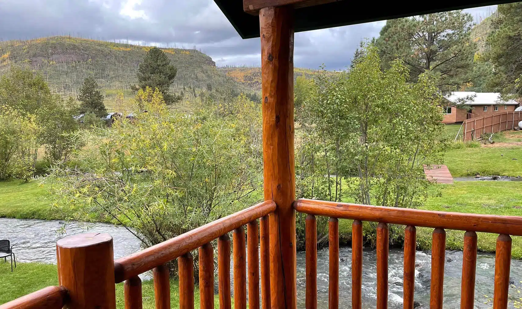 Cabin #97 with views of fall colors along the river in Greer, Arizona